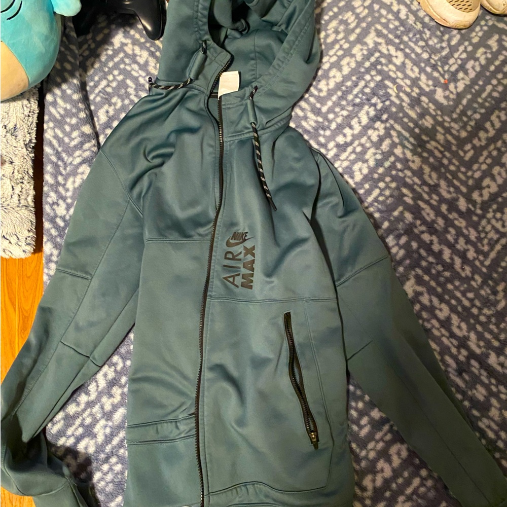 Medium/Large (will fit both sizes) Green nike tech.